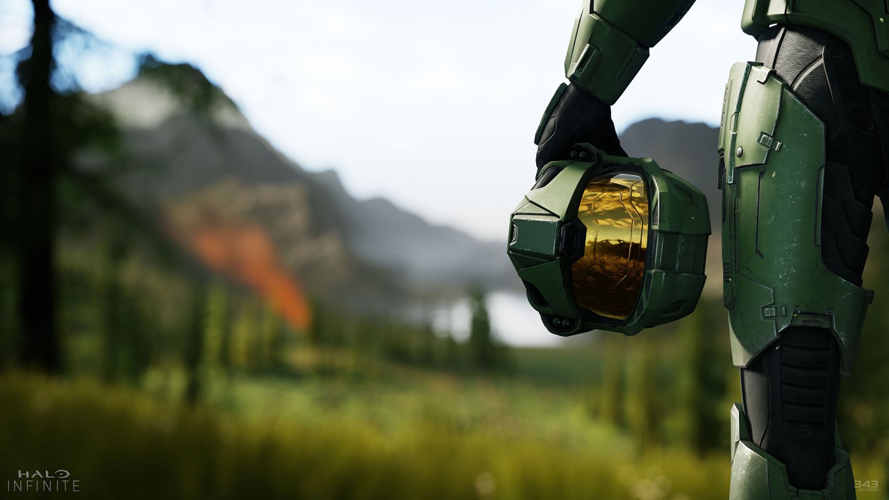 A screenshot from Halo Infinite's E3 2018 reveal trailer, featuring a view of Master Chief holding his helmet.