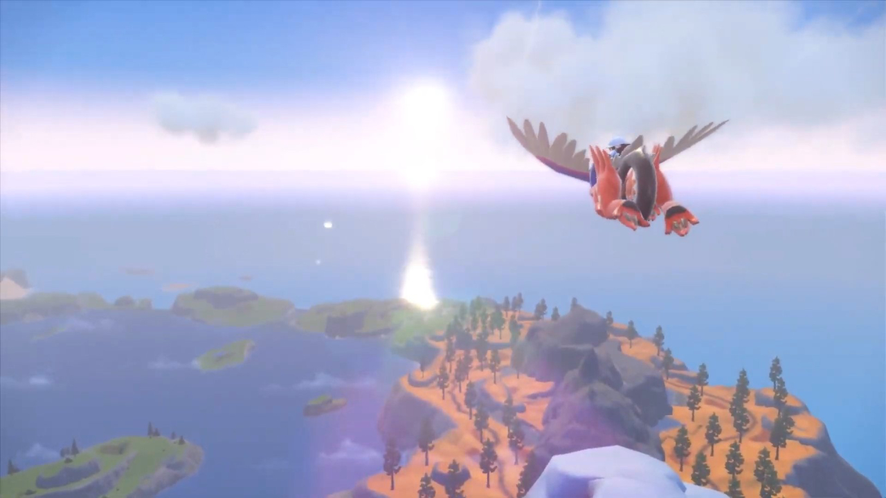 A screenshot of a long glide over Socarrat Trail in Pokémon Scarlet.
