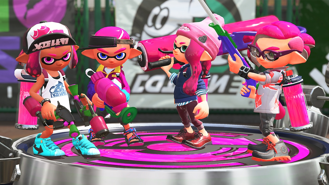 A screenshot of a team of Inklings posed together from Splatoon 2.