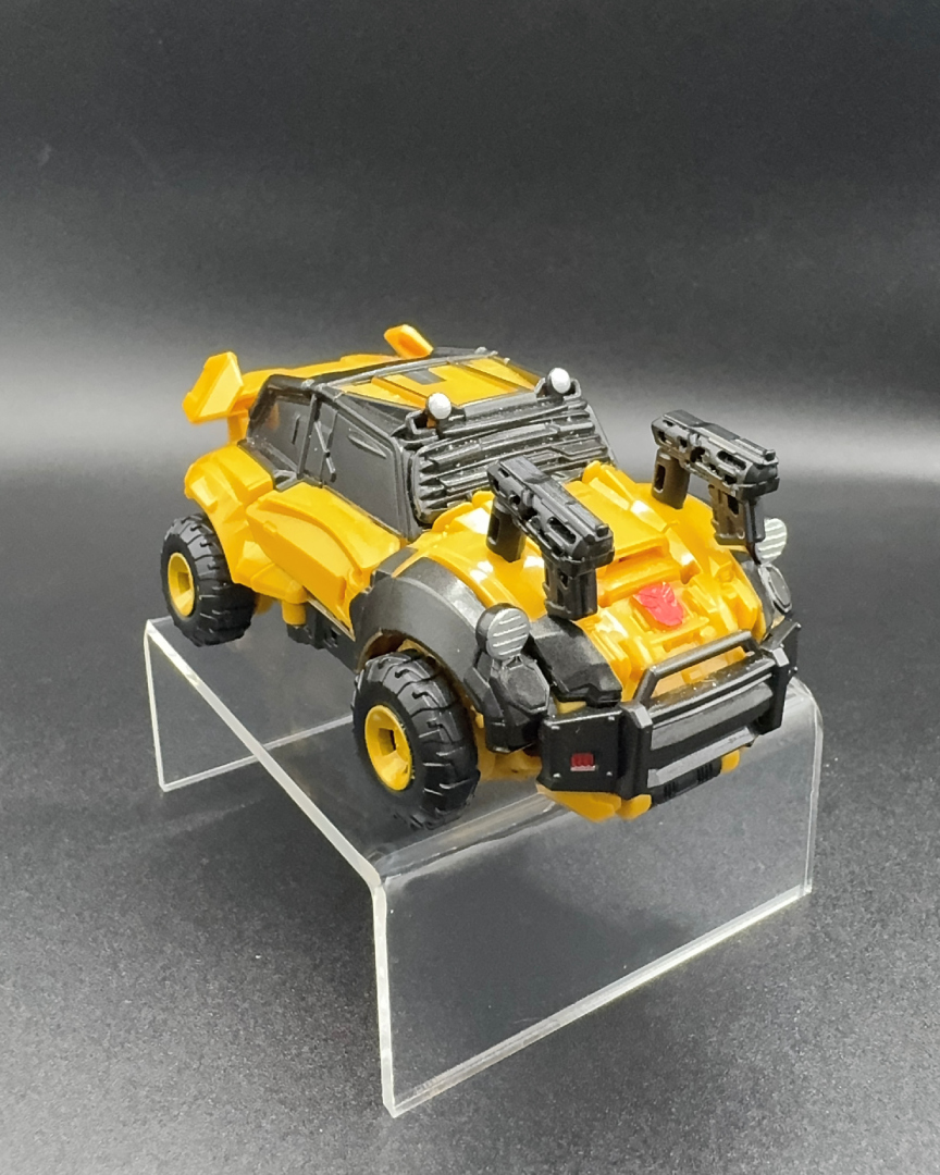 i don't really know enough about how a car actually works to know if that many bars and cages are worth anything for keeping you safe, but i do know they look rad and they probably would have given you +10% defense or something A picture of Blurr in vehicle mode.