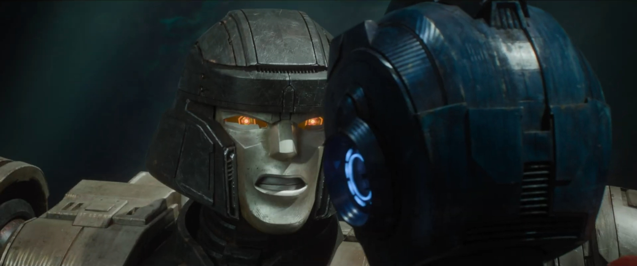 A shot from Transformers One, with D-16 in a tense conversation with Orion Pax.