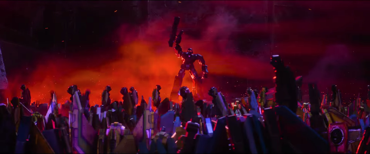 A shot from Transformers One's post-credits scene, with Megatron rallying his newly-named Decepticons.