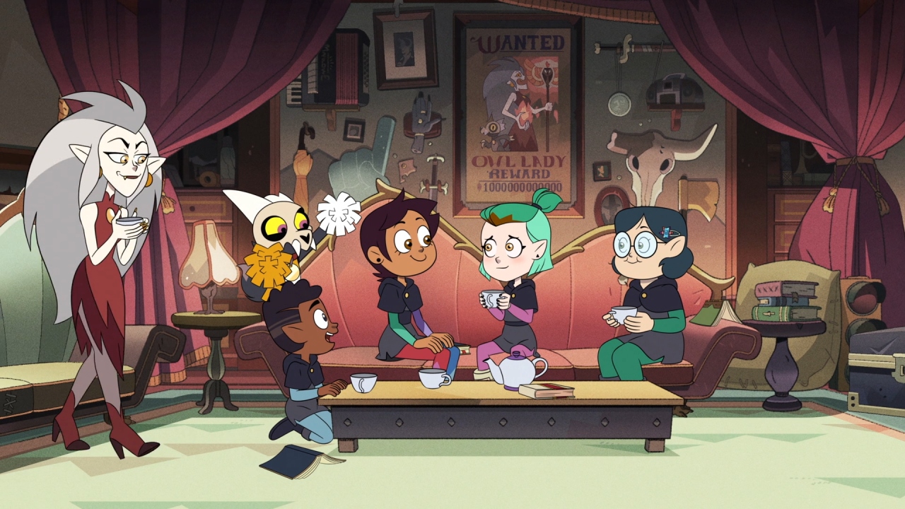 A screenshot from Wing It Like Witches, with Amity being welcomed by her friends at the Owl House.